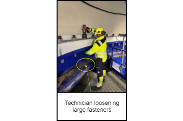 Technician loosening large fasteners