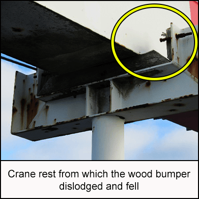 Crane rest from which the wood bumper dislodged and fell