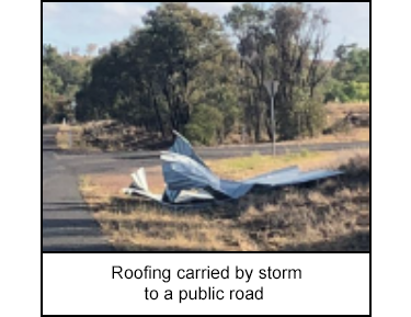 Roofing carried by storm to a public road