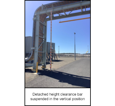 Detached height clearance bar suspended in the vertical position