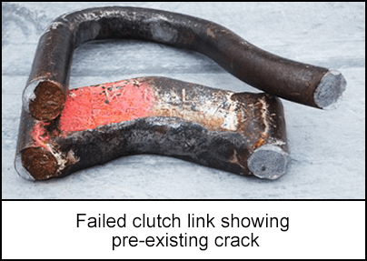 Failed clutch link showing pre-existing crack