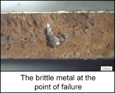 Image of the brittle metal at the point of failure 