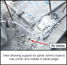 View showing support for panel (shims close to one corner and middle of panel edge)