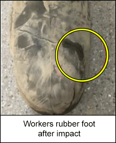 Workers rubber foot after impact