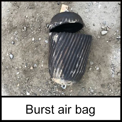 The burst air bag with a large tear 