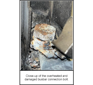 Close-up of the overheated and damaged busbar connection bolt.