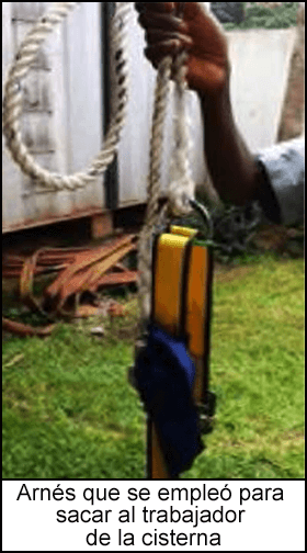 Un trabajador muestra el arnés que se empleó para sacar al trabajador de la cisterna.