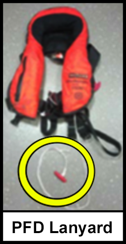 A red and black personal floatation device with a PFD lanyard hanging from the personal floatation device. 