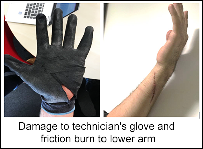 Technician receives friction burn on hand during rotor lock removal
