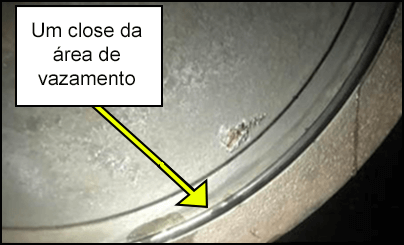 125-slide-1-PT.png Um close da área de vazamento