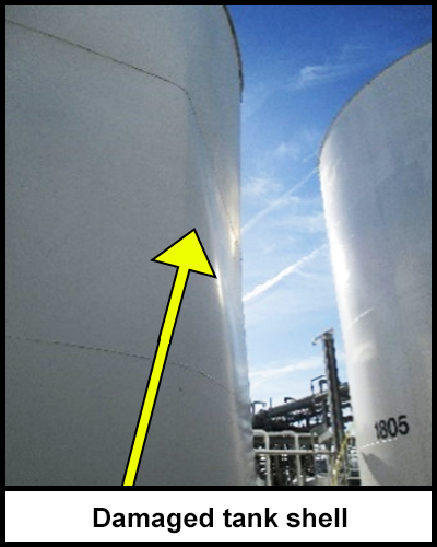 Two 2100 barrel carbon steel above ground storage tanks. One tank has a large dent on it’s shell.  