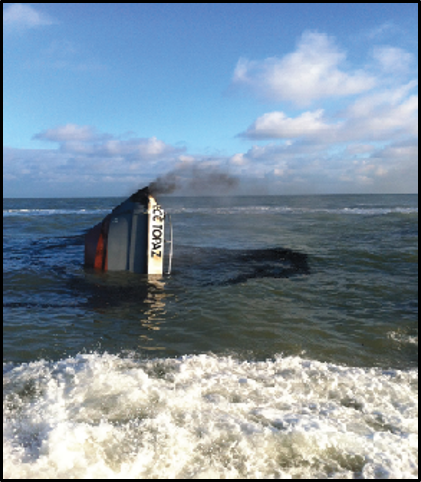 The tip of the boat visible. The remainder of the boat has been submerged in water. 