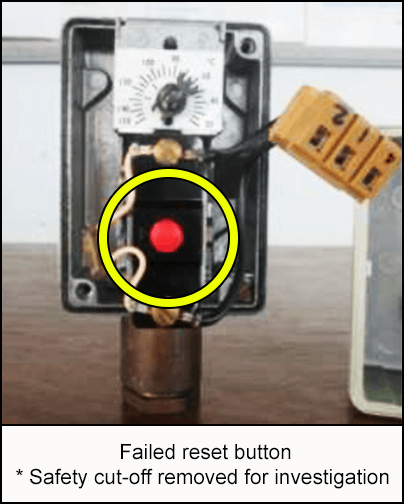 Failed reset button with safety cut-off removed for investigation
