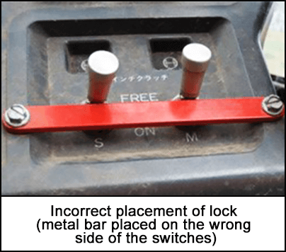 Incorrect placement of lock (metal bar placed on the wrong side of the switches)