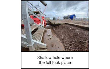 Shallow hole where the fall took place