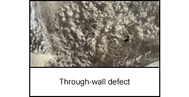 Through-wall defect